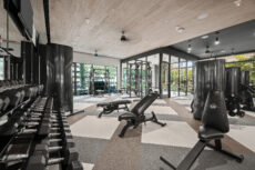Modern apartment fitness center photographed by Houston architectural photographer
