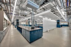 Industrial interior photography showcasing pipes, valves, and equipment