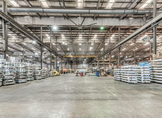 Industrial environment showcasing pipes, tanks, and structural elements