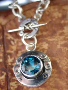 blue gemstone pendant necklace product photography Houston